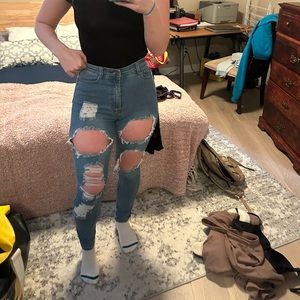 Distressed fashion nova skinny jeans